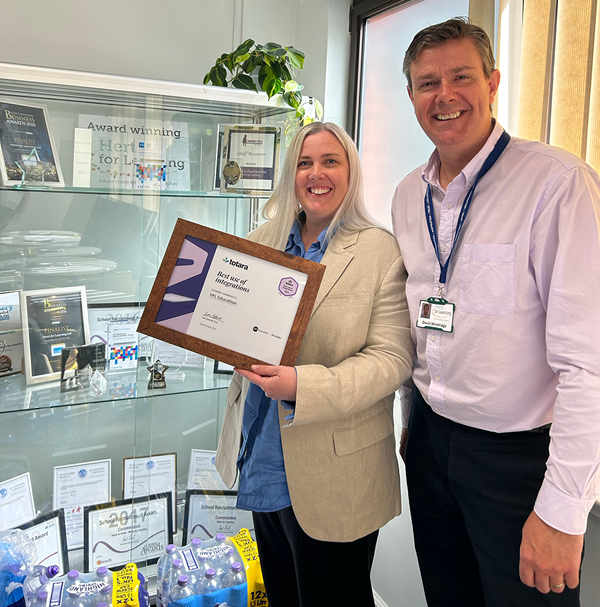 Kelle Aitken-Mardlin and Dave Windridge with the award