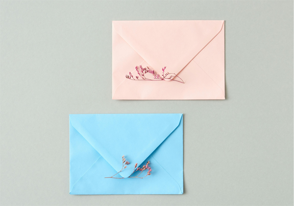 Pink and blue letters on grey background