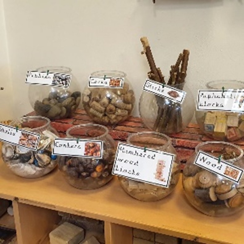 Assorted natural items in large glass bowls