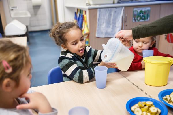 Child with jug of milk