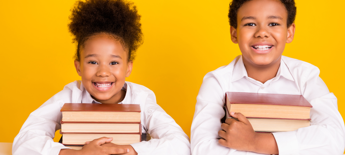Children hugging books