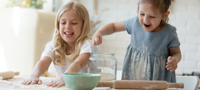 Early Years children playing with food