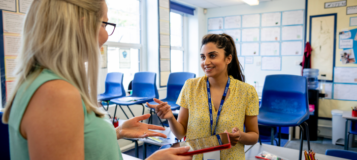 two female teachers in a staff room