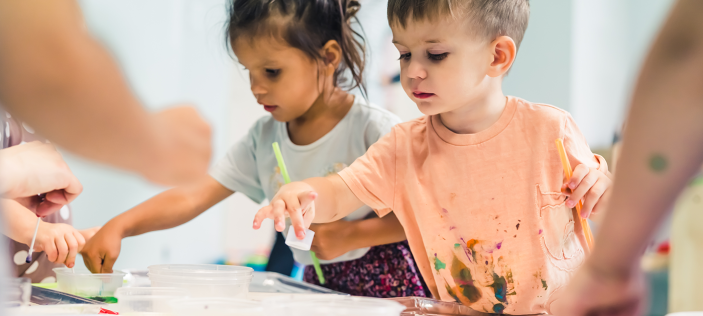 young children playing in a classroom