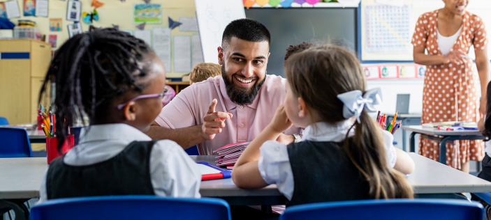 Teacher with pupils in class