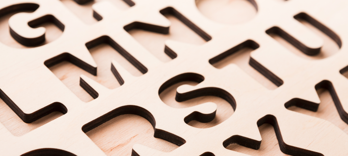 Alphabet shapes in wood