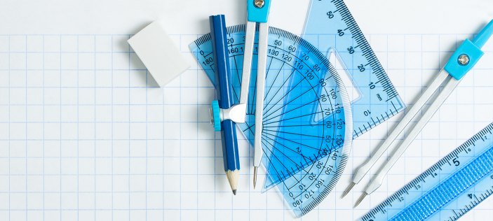 Maths equipment spread across desk