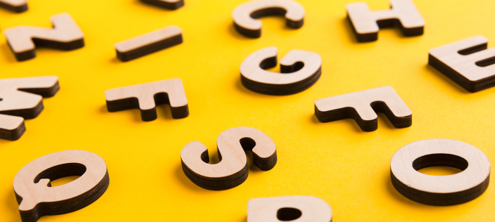 Random letters on yellow background