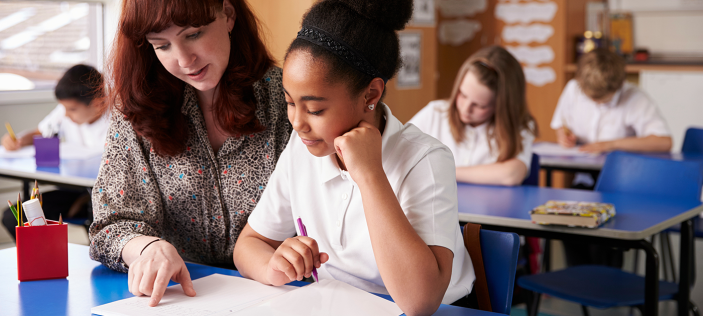 children with teacher reading