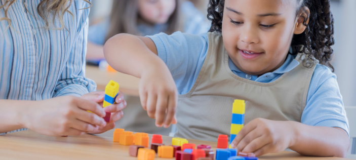 Girl with counting blocks