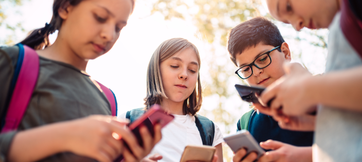 Children using mobile phones