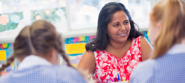 Essential maths - teacher and pupils