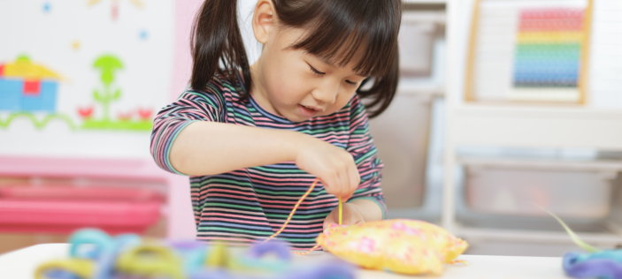 Young girl sowing