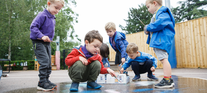 Children playing in puddle