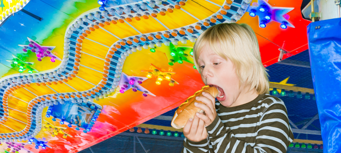 Child eating a hotdog