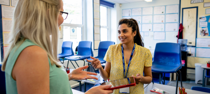 two female teachers talking
