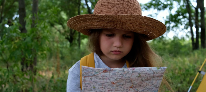 Girl reading a map