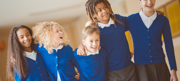 children in blue uniforms