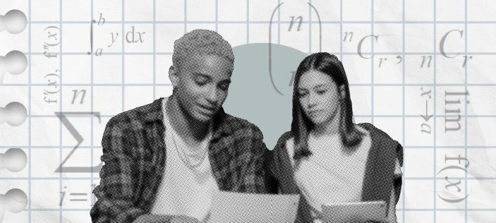 Two post 16 teenagers sitting looking at papers