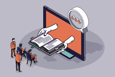 hands producing a book from an orange screen