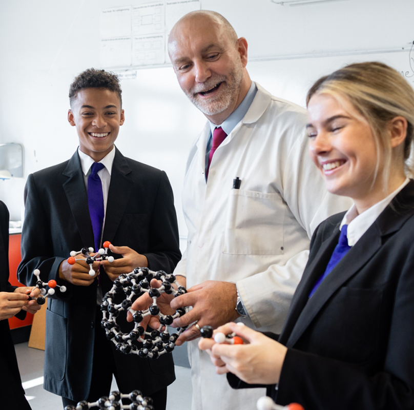 Group of students boys and girls in a science lab