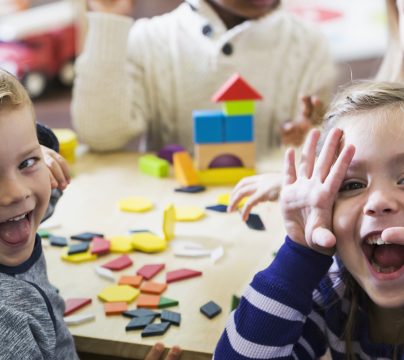 children pulling funny faces