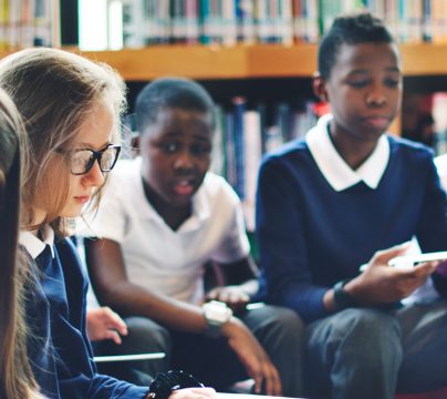 Group of children reading in the library