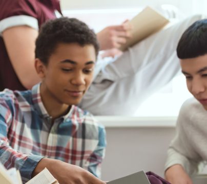 3 teenagers together studying