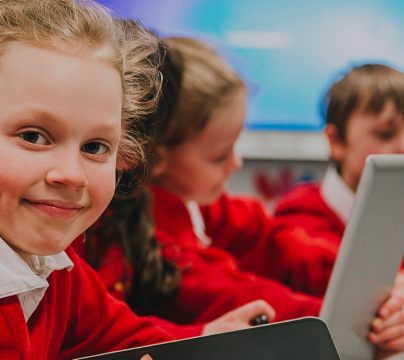 primary school children using ipads