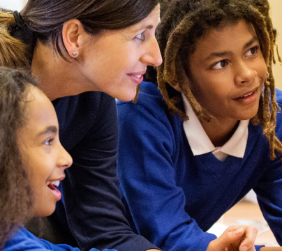 primary pupils around computers