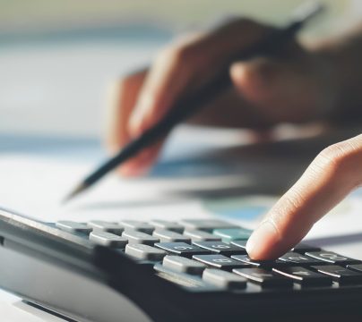 someone using a calculator