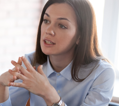 Woman sitting opposite another female