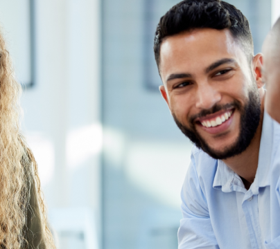 man and 2 women talking