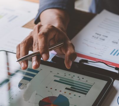 person reading financial documents