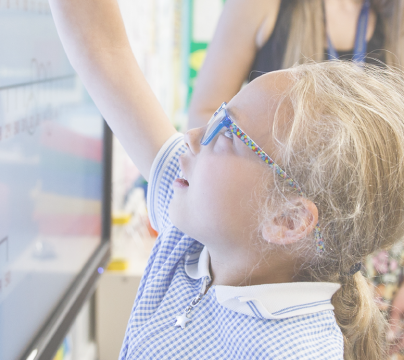 child on whiteboard