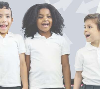 group of children in front of an image