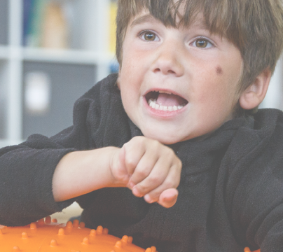 A child using sensory equipment