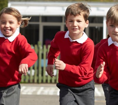 Children running in a school playground