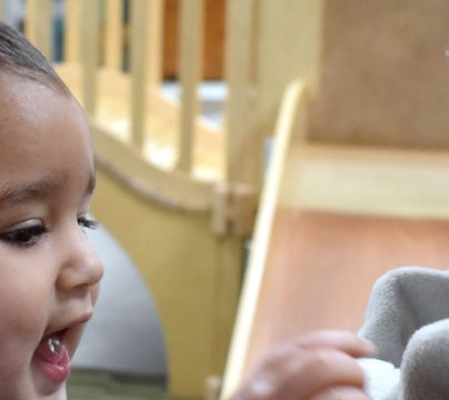 Child and carer playing