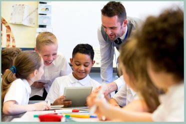 teacher with primary school children