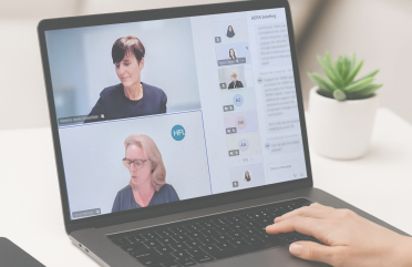 Laptop screen showing a video conference call