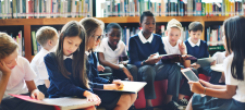 secondary aged children in a group in a library