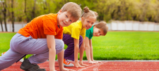 children at a start line for running