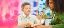 Bring language to life – be more aardvark Teacher with pupil