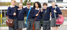 How can we advantage the disadvantaged? Happy pupils outside school setting