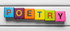Coloured blocks spelling out 'poetry'