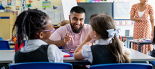 Teacher with pupils in class