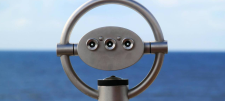 Coin operated binoculars