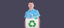 Boy holding recycling box