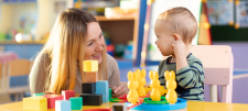 female practitioner with early years child